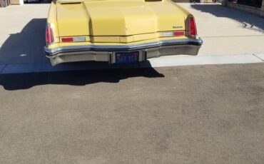 Olds-toronado-1973-yellow-4