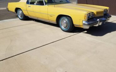 Olds-toronado-1973-yellow