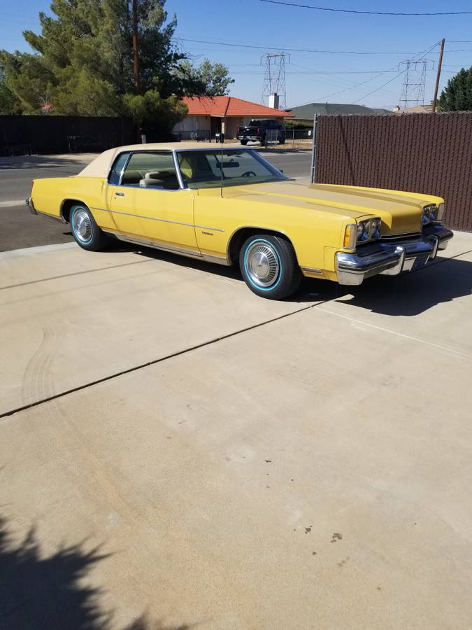 Olds-toronado-1973-yellow
