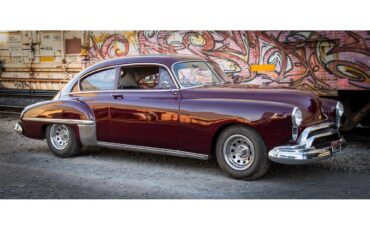 Oldsmobile-76-1949-Maroon-Grey-1