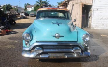 Oldsmobile-88-4-door-1953-blue-1