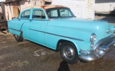 Oldsmobile-88-4-door-1953-blue