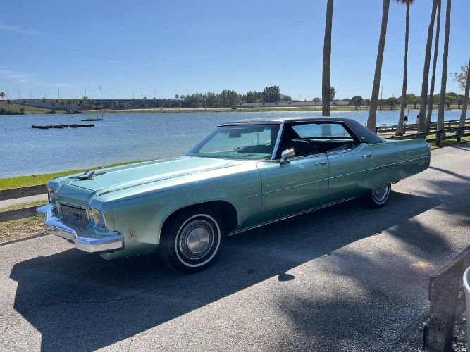Oldsmobile-98-1973-GreenBlack-Vinyl-To-13