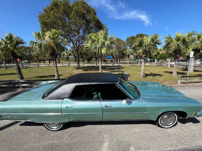 Oldsmobile-98-1973-GreenBlack-Vinyl-To-5