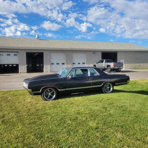 Oldsmobile-Cutlass-1965-Black-Black