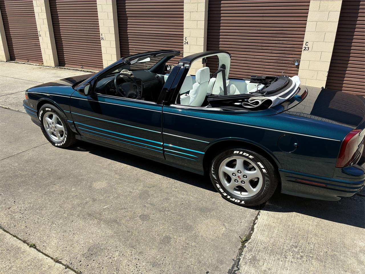 Oldsmobile-Cutlass-supreme-1995-Metallic-teal-White-1