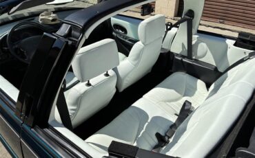 Oldsmobile-Cutlass-supreme-1995-Metallic-teal-White-12