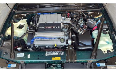Oldsmobile-Cutlass-supreme-1995-Metallic-teal-White-15