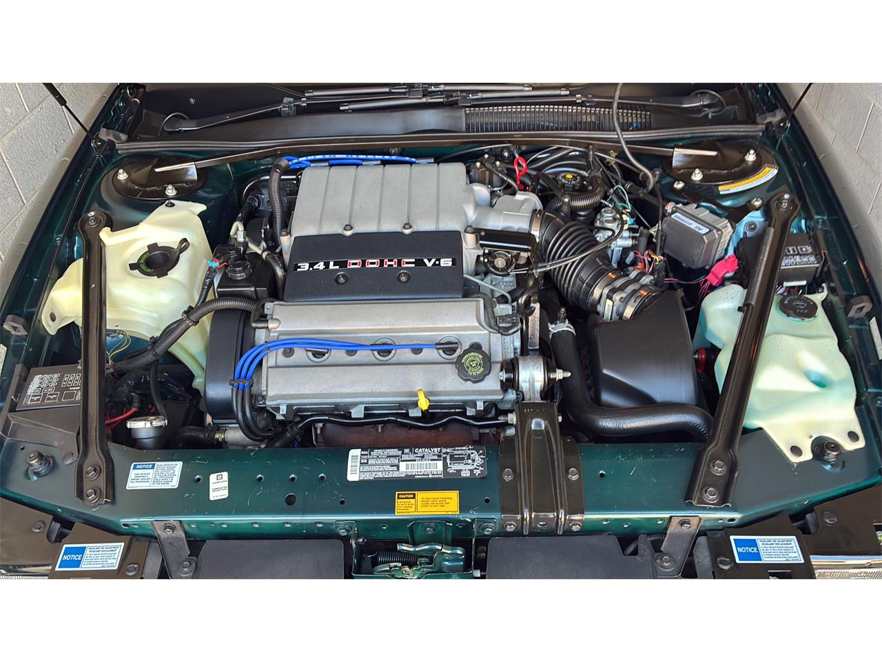 Oldsmobile-Cutlass-supreme-1995-Metallic-teal-White-15