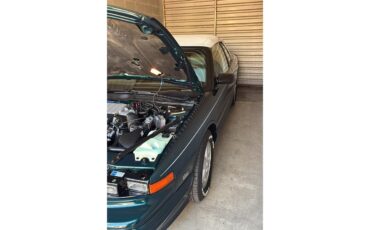 Oldsmobile-Cutlass-supreme-1995-Metallic-teal-White-17