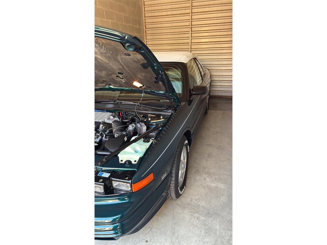 Oldsmobile-Cutlass-supreme-1995-Metallic-teal-White-17