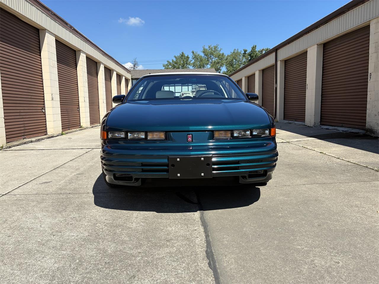 Oldsmobile-Cutlass-supreme-1995-Metallic-teal-White-2