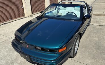 Oldsmobile-Cutlass-supreme-1995-Metallic-teal-White-27
