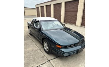 Oldsmobile-Cutlass-supreme-1995-Metallic-teal-White-3