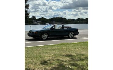 Oldsmobile-Cutlass-supreme-1995-Metallic-teal-White