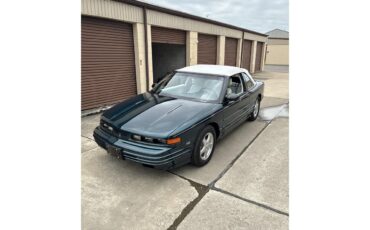 Oldsmobile-Cutlass-supreme-1995-Metallic-teal-White-4