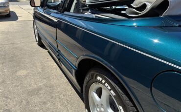 Oldsmobile-Cutlass-supreme-1995-Metallic-teal-White-5
