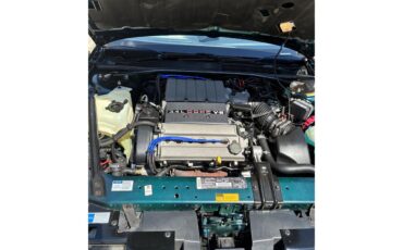 Oldsmobile-Cutlass-supreme-1995-Metallic-teal-White-7