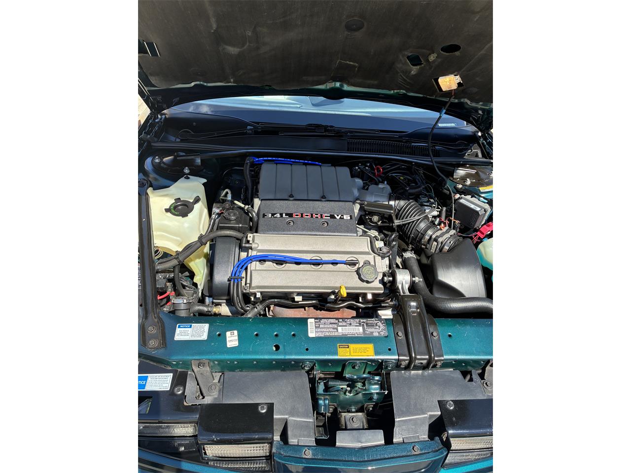 Oldsmobile-Cutlass-supreme-1995-Metallic-teal-White-7