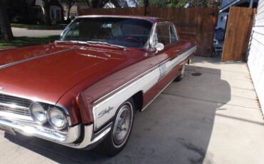 Oldsmobile-Starfire-1962-Red-2