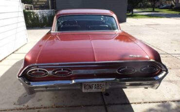 Oldsmobile-Starfire-1962-Red-3