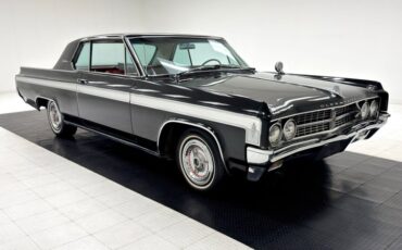 Oldsmobile-Starfire-1963-Ebony-Black-Red-17