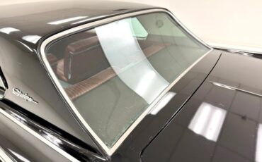 Oldsmobile-Starfire-1963-Ebony-Black-Red-24