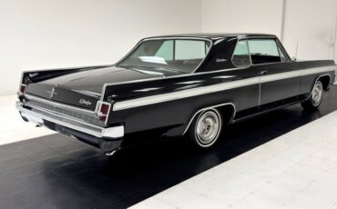 Oldsmobile-Starfire-1963-Ebony-Black-Red-4
