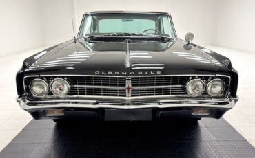 Oldsmobile-Starfire-1963-Ebony-Black-Red-5