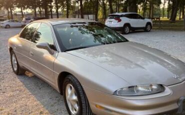 Oldsmobile-aurora-1995-brown