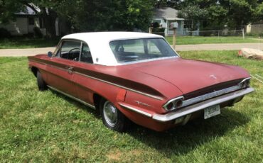 Oldsmobile-cutlass-1962-red-3