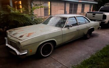 Oldsmobile-cutlass-1974-green-2