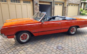 Oldsmobile-cutlass-diesel-1965-red
