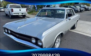 Oldsmobile-cutlass-f85-1964-silver-1