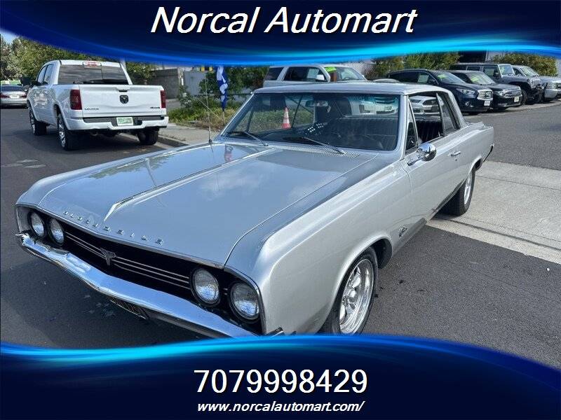 Oldsmobile-cutlass-f85-1964-silver-1