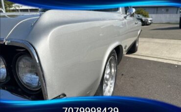 Oldsmobile-cutlass-f85-1964-silver-10