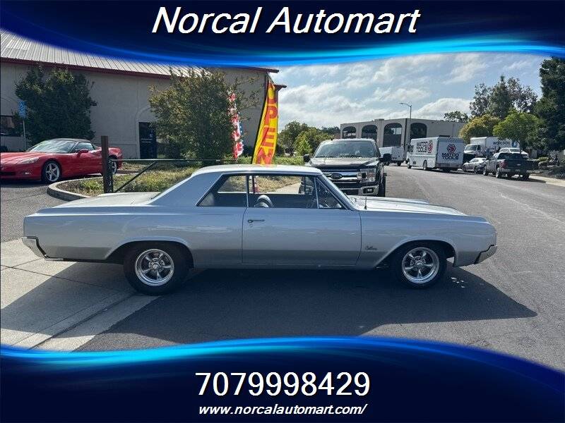 Oldsmobile-cutlass-f85-1964-silver-2