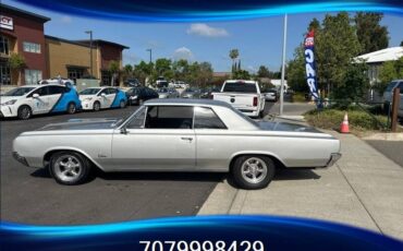 Oldsmobile-cutlass-f85-1964-silver-5