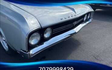 Oldsmobile-cutlass-f85-1964-silver-9
