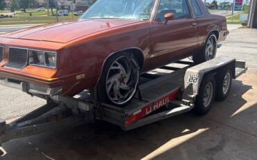 Oldsmobile-cutlass-supreme-1983-orange-1