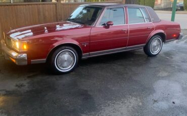 Oldsmobile-cutlass-supreme-1984-red-1