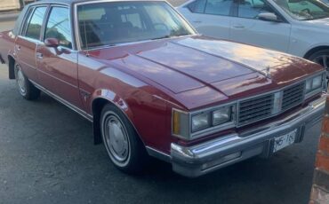 Oldsmobile-cutlass-supreme-1984-red-22