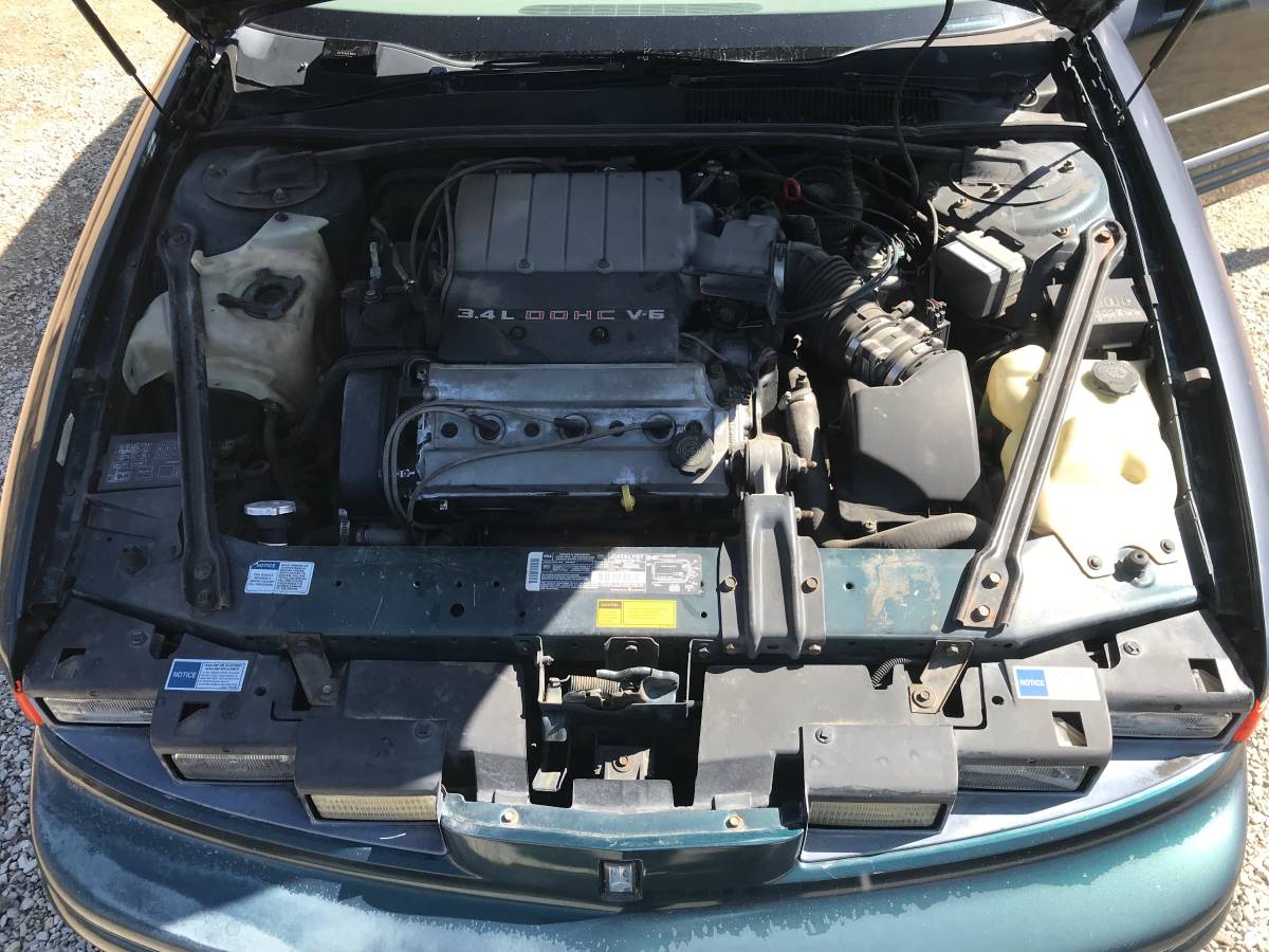 Oldsmobile-cutlass-supreme-1995-green-7