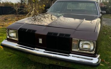 Oldsmobile-cutlass-supreme-brougham-1979-red-7