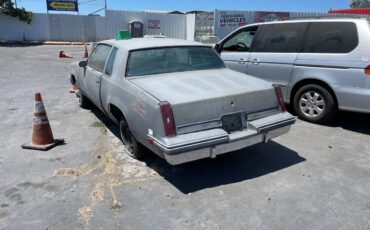 Oldsmobile-cutlass-supreme-brougham-1986-grey-2