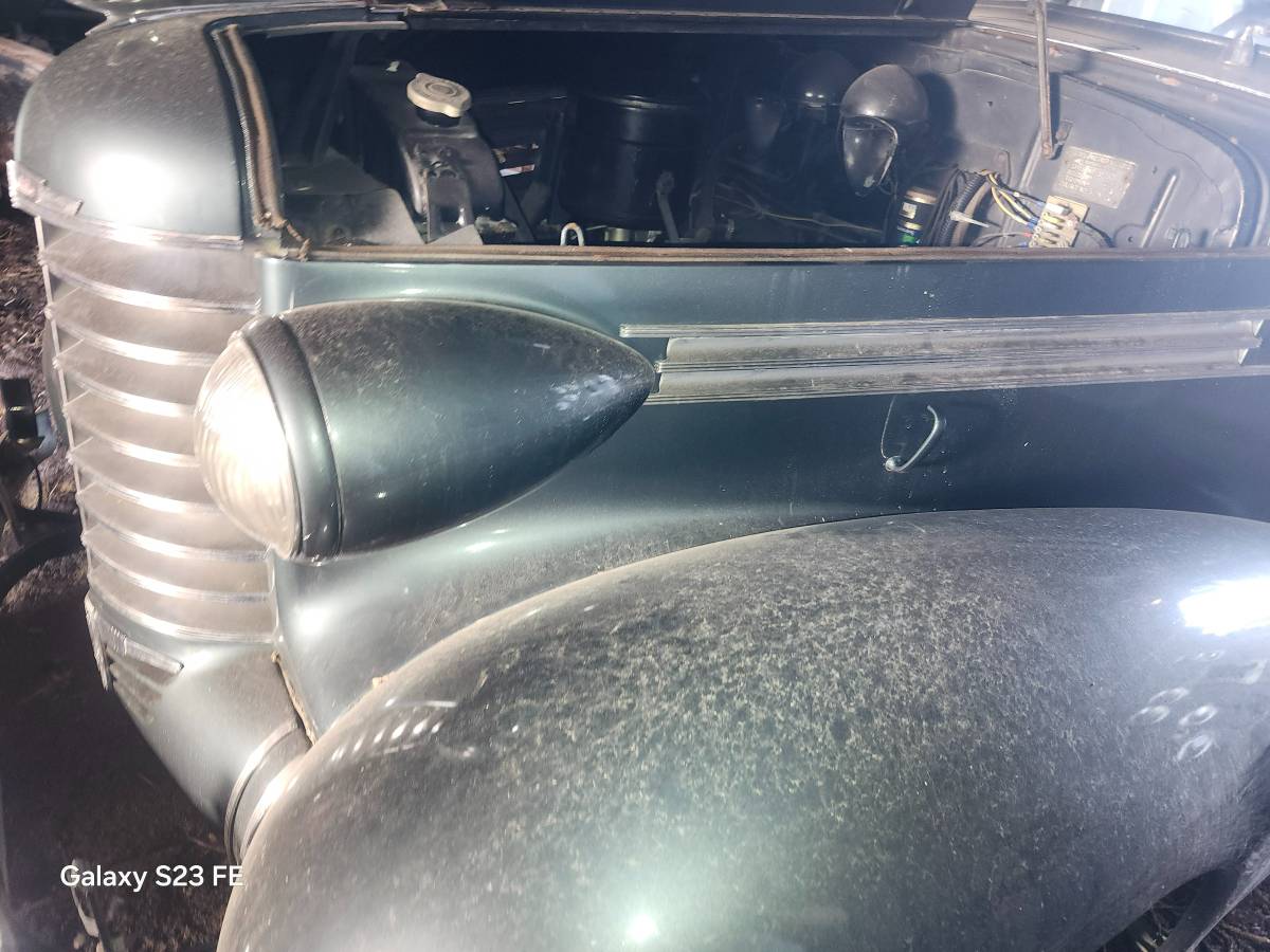 Oldsmobile-f3-dr.-coupe-1937-grey-10