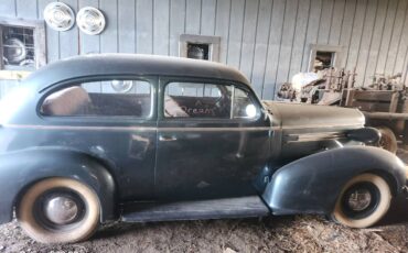 Oldsmobile-f3-dr.-coupe-1937-grey-16
