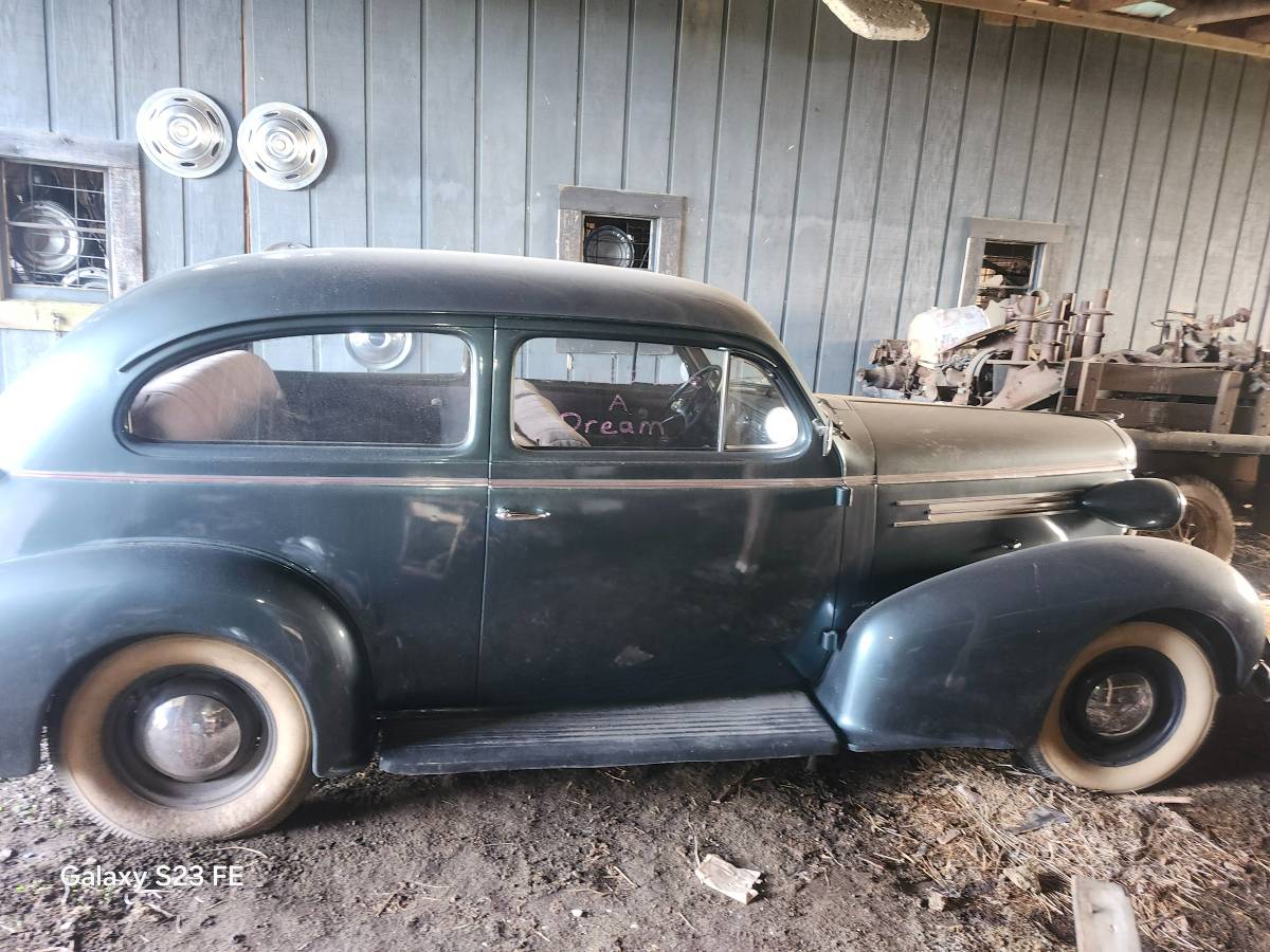Oldsmobile-f3-dr.-coupe-1937-grey-16