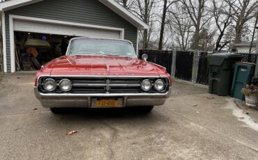 Oldsmobile-starfire-convertible-1964-red-2
