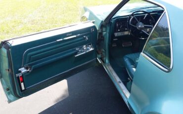 Oldsmobile-toronado-1966-green-11
